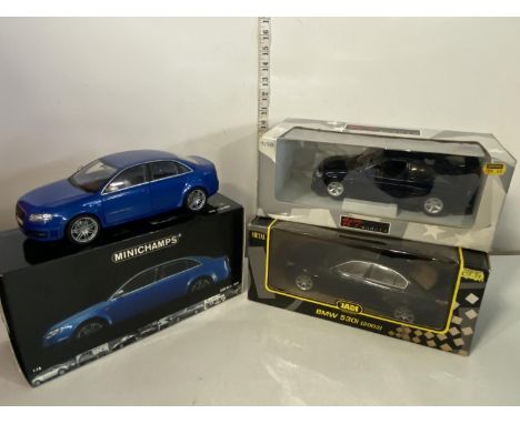 Three assorted boxed 1:18 scale die-cast models including a Minichamps Audi RS4 2006