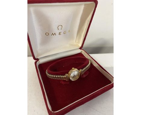 A boxed ladies Omega 9ct gold cased cocktail watch, ticking at the time of cataloguing