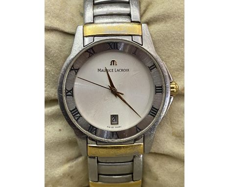 A boxed Maurice Lacroix watch (needs a new battery)