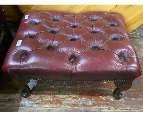 A oxblood red Chesterfield footstool, shipping unavailable