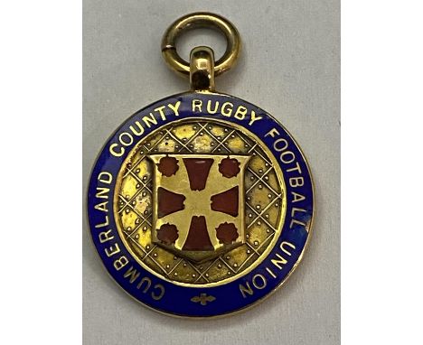 A hallmarked 9ct gold  and enamel medal 'Cumberland Country Rugby Football Union' Season 1929/30 11g 