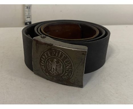 A Third Reich WW2 period Wehrmacht belt buckle with makers mark and date stamped for 1940 with original leather belt