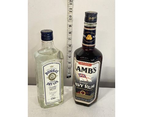 A bottle of Lambs Navy Rum 70cl and a bottle of Bombay Gin 70cl