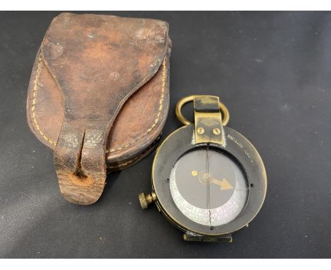 A WW1 period military compass with leather pouch by Cruchon &amp; Emons London 1918