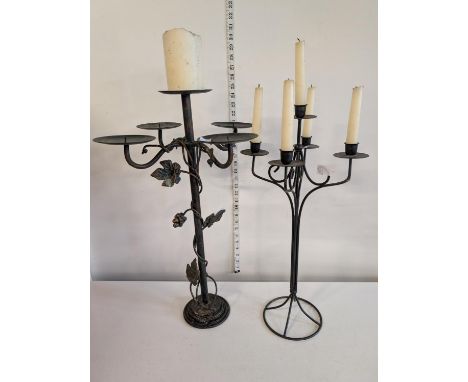 Two wrought iron candlestick holders, shipping unavailable