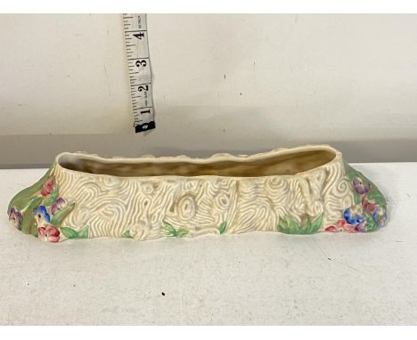 A Clarice Cliff trough vase (slight chip to rim)