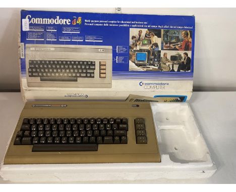 A Commodore 64 console (no leads) untested