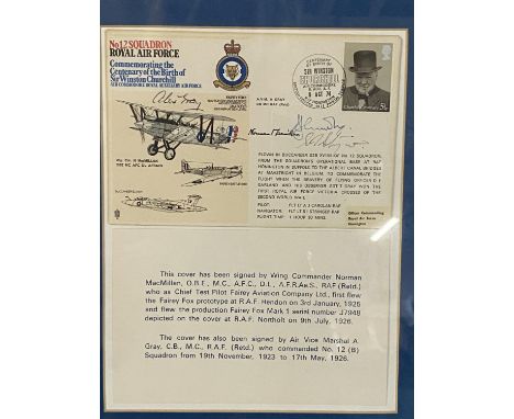 A framed Royal Airforce ephemera signed by wing commander Norman Macmillan and Air Vice Marshall A. Grey