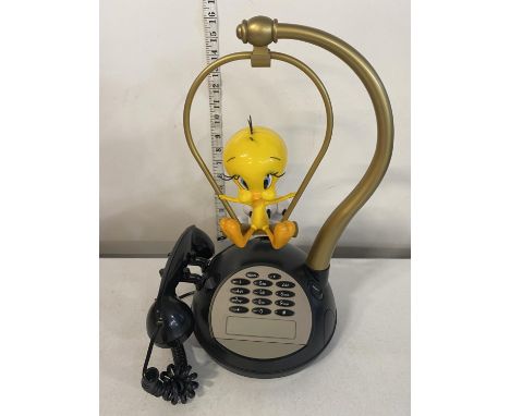 A vintage Sylvester and Tweety pie working telephone, shipping unavailable