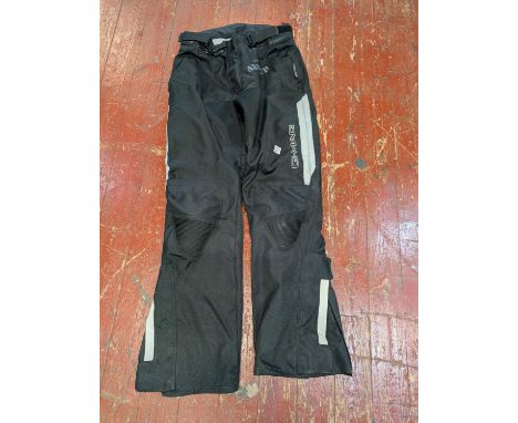 A pair of urban armour motorcycle trousers size XL