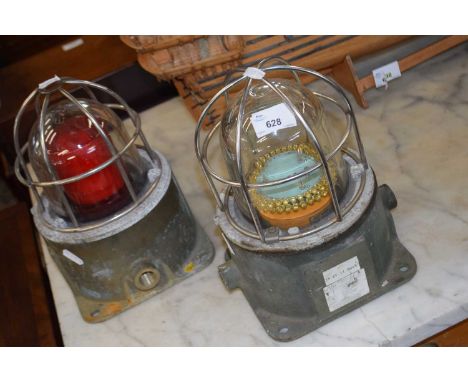 Two vintage ships lights with metal outer cages, 25cm high