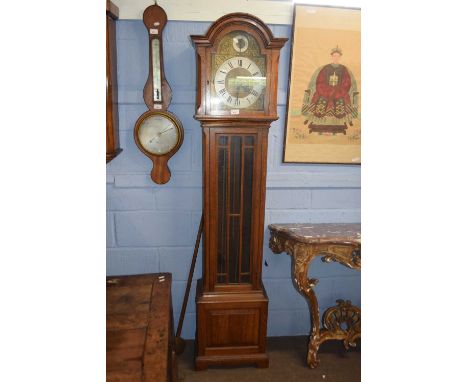 A 20th Century oak cased grandmother clock with a brass triple weight movement playing Westminster Wittington and St Michael 