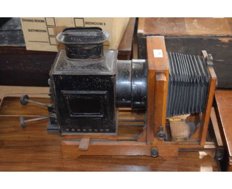 A vintage Magic Lantern projector with bellows action to front, approx 45cm long