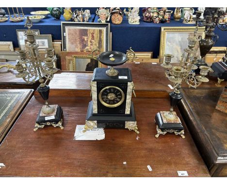 Late 19th Century clock garniture complete with three four sconce candelabra