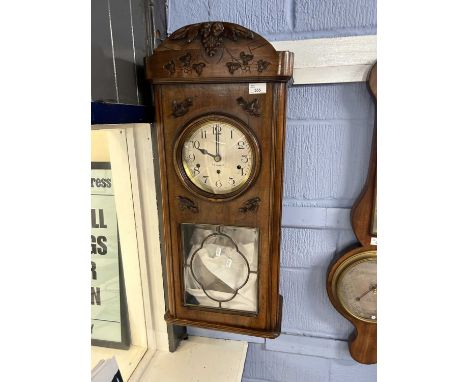 Early 20th Century continental wall clock, the silvered dial signed Le Cateau, 85cm high