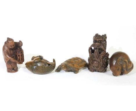 Further group of carved wooden Netsuke including a fish and tortoise