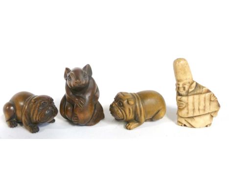 A small plastic bag containing four carved Netsuke, one modelled as a mouse and further modelled as a dog
