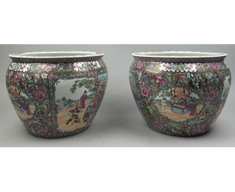 A PAIR OF CHINESE 'TAO KUANG' FAMILLE ROSE CERAMIC JARDINIERES, with fish interior and six character seal marked to bases.Not