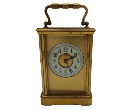 A French brass carriage clock with Arabic numerals on enamel chapter ring Richard &amp; Co mark to back of movement, height 1