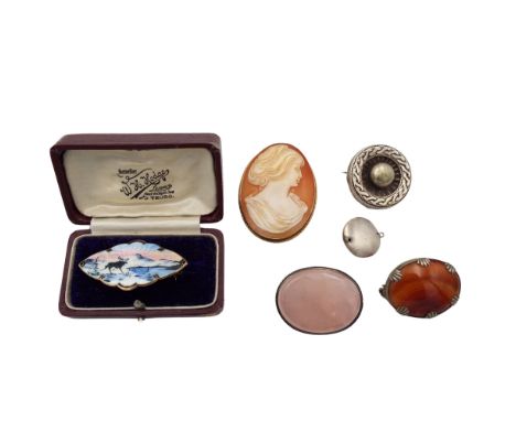 A Norwegian silver enamel brooch in box together with a cameo brooch three other brooches and a pendant.