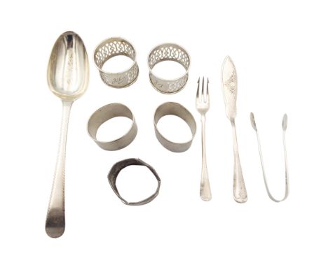 A William Collings silver table spoon, London 1774, length 22cm; two pairs of silver napkin rings and a single damaged silver