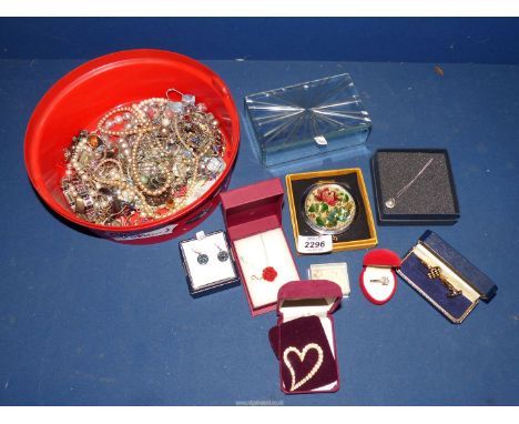 A quantity of costume jewellery including boxed compact, mirrored glass trinket box, etc.