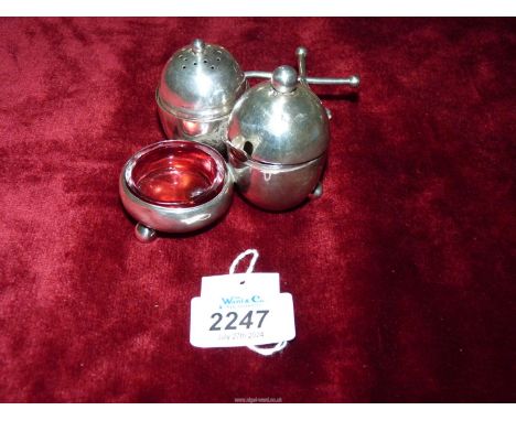 A Silver Cruet set, Sheffield 1877, maker Henry Wilkinson & Co with a cranberry glass liner and a Silver spoon, Birmingham ha