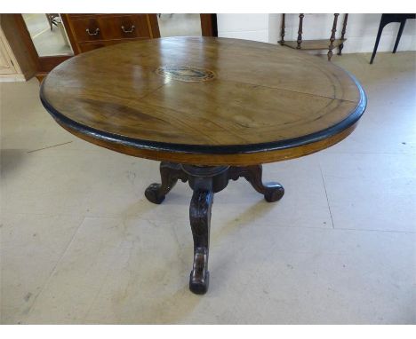 Edwardian inlaid mahogany oval table with carved tripod base