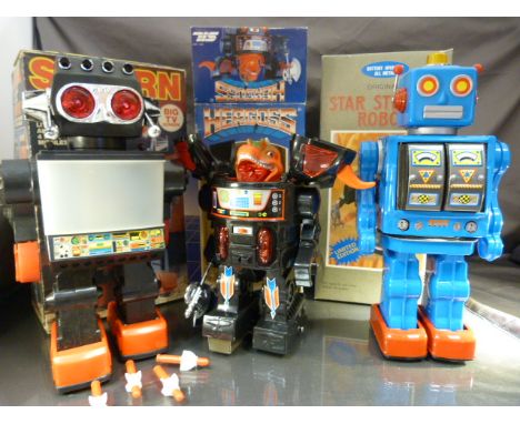 Three Vintage battery operated Robots in original boxes. To include a Japanese Star Strider Robot (box good), Saturn 13" Gian