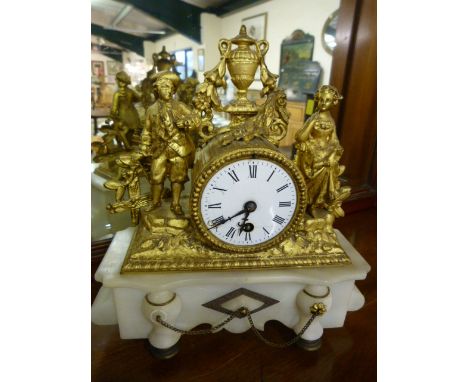 French style mantle clock with enamel face on Alabaster plinth. Spelter decorated face with two figures with side. Urn finial