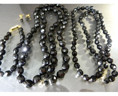 Vintage Black stone bracelet and matching earring set along with two similar necklaces
