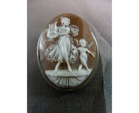 Silver (800) Brown Cameo Brooch, a very fine Cameo depicting Erato playing her Lyre and dancing, with Cupid dancing beside he