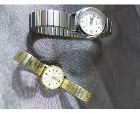 9ct Gold Tissot ladies wrist watch - strap is plated. Along with a Lorus ladies wrist watch