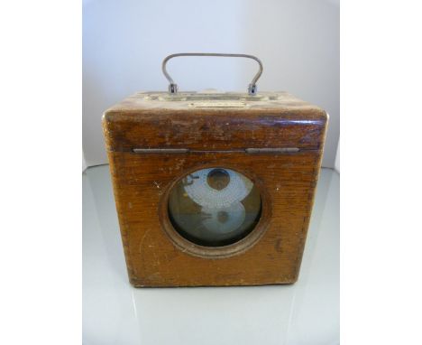 Belgica oak cased pigeon racing clock, metal curved handle and movement works.