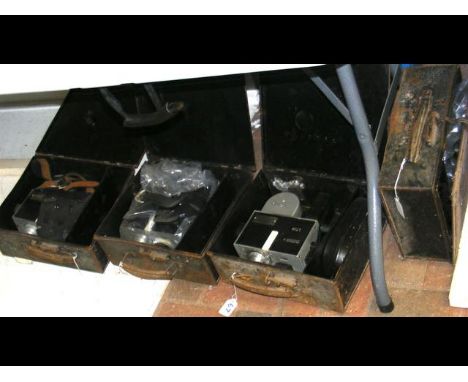 Three old Bus Conductor's ticket machines in metal cases 