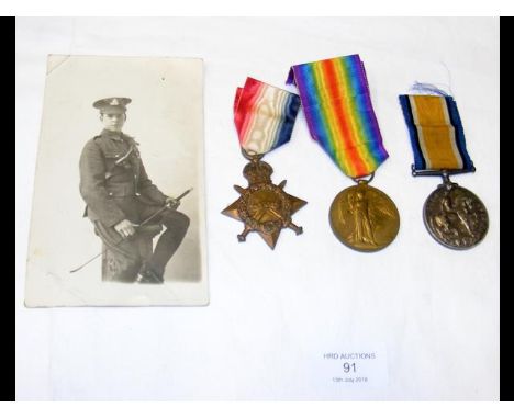 First World War three medal group to Gunner J R Scarlett - No.34194 RFA Egypt - with original photograph and photocopied docu