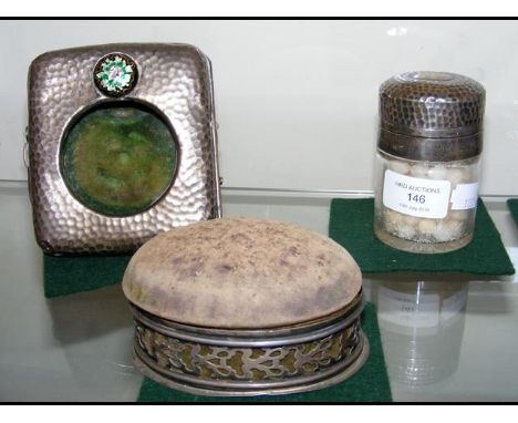 A silver top scent bottle, pocket watch holder and pin cushion 