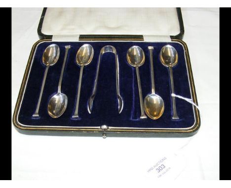 A cased set of six silver teaspoons with sugar tongs 