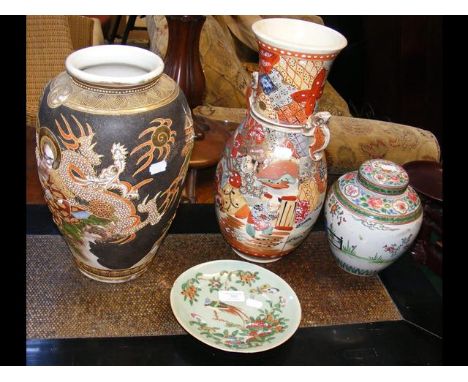 A Chinese ginger jar and cover with signature to base, together with three other oriental pieces of ceramic ware 