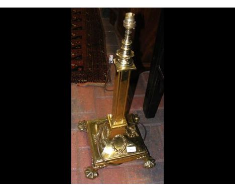 A heavy decorative 64cm high brass Corinthian lamp 