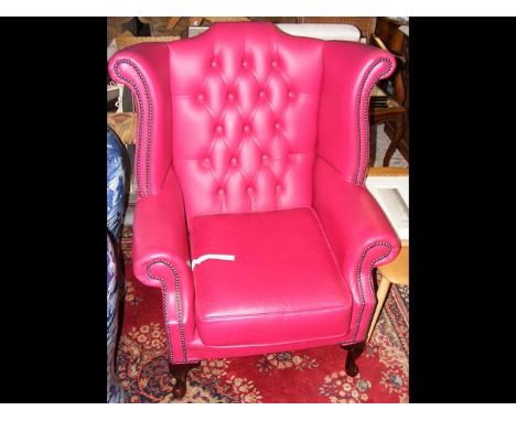 The matching wing easy chair with button back 