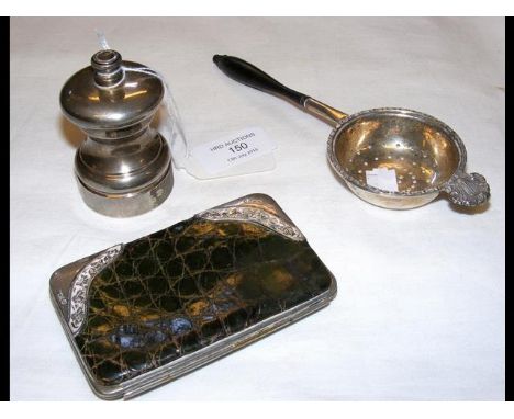 A silver pepper-mill, strainer, etc. 