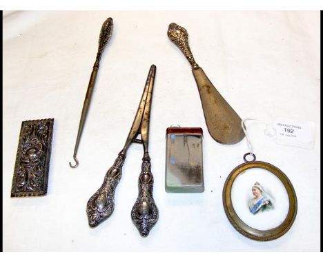 Silver handled glove stretchers, lighter, etc. 