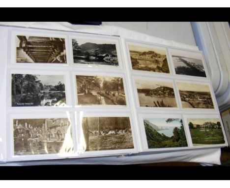 Album containing 300 vintage British topographical postcards 
