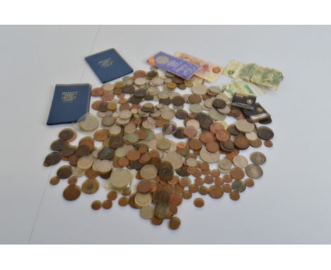 A quantity of miscellaneous British and World coinage, including a Victorian gothic florin, a wreath half crown, a West Afric