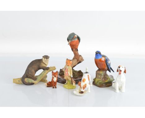 A collection of ceramic and resin animal figures, including Royal Doulton, Border Fine Arts and Country Artists (7)