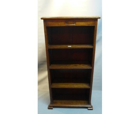 An early 20th century oak open bookcase rasied on bracket feet. H- 130cm W- 65cm D-28cm 