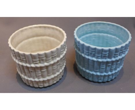 A pair of Casa Pupo ceramic pot's having bamboo decoration in a blue and white glaze. 