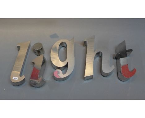 A back lit sign 'Light'.