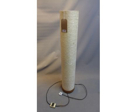 A cylindrical fibre glass floor lamp, H.112cm